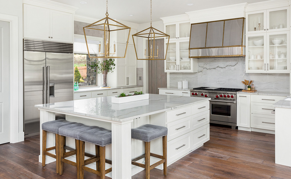 White kitchen with gold accents